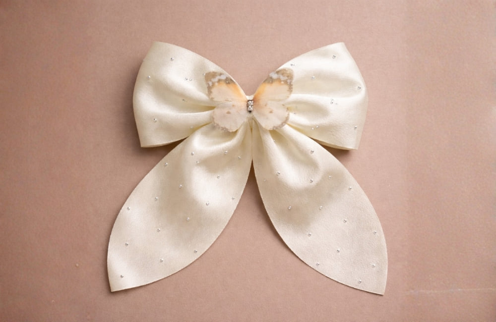 img_20260103102058959_NHAQI | Glowviera.com Ivory Satin Hair Bow Clip with Butterfly